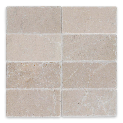 Botticino Marble Tumbled Tile 6x12 with a soft beige tone and natural veining, perfect for elegant interiors.